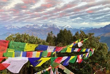 Prayer flags and mountain view of annapurna base camp  dovan