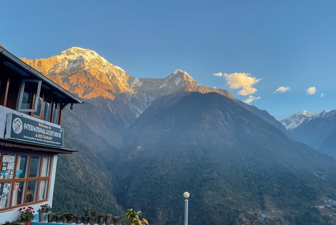 View Of Annapurna South And Hiunchuli Peaks From Guesthouse Terrace In Chhomrong Village