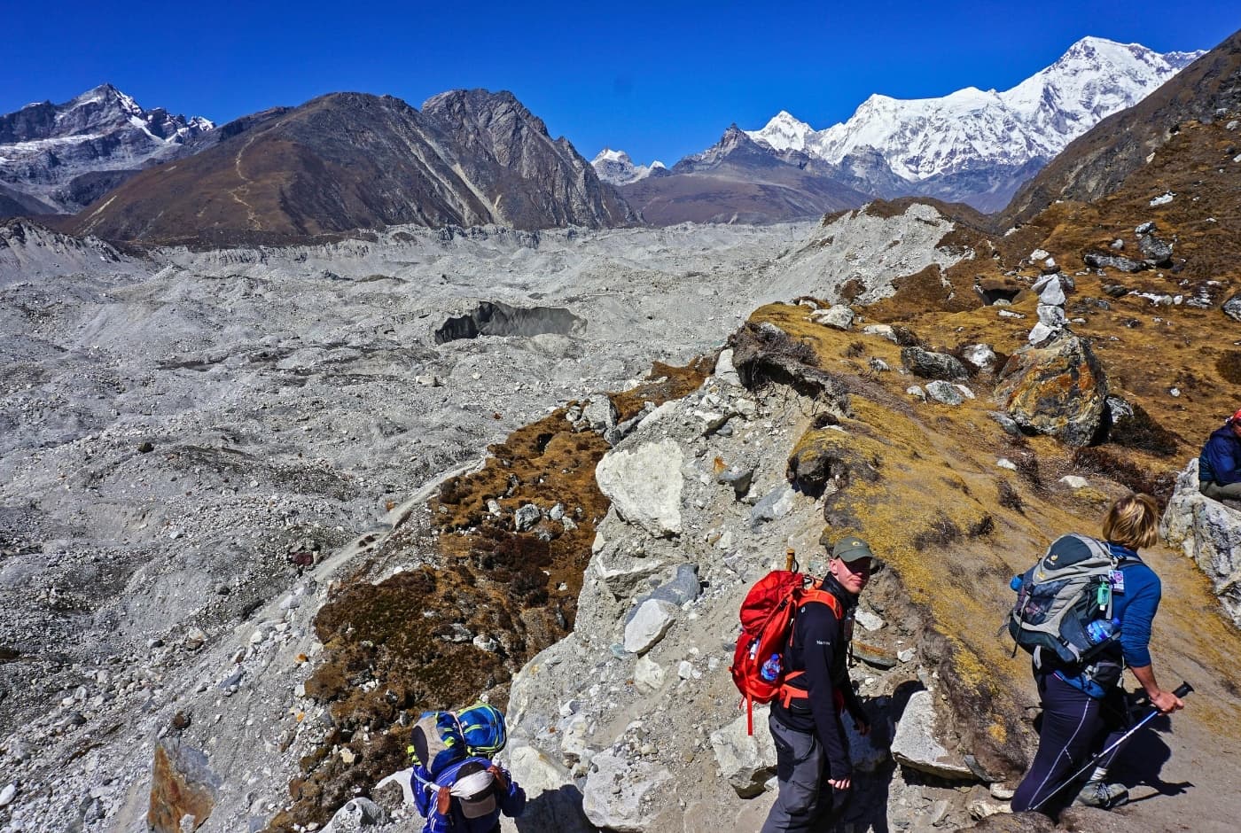 Walking along a rocky trail near the Ngozumpa Glacier