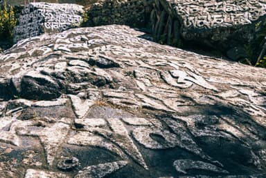 Mani stones, Tibetan script, stone carvings   monjo , Everest Trek