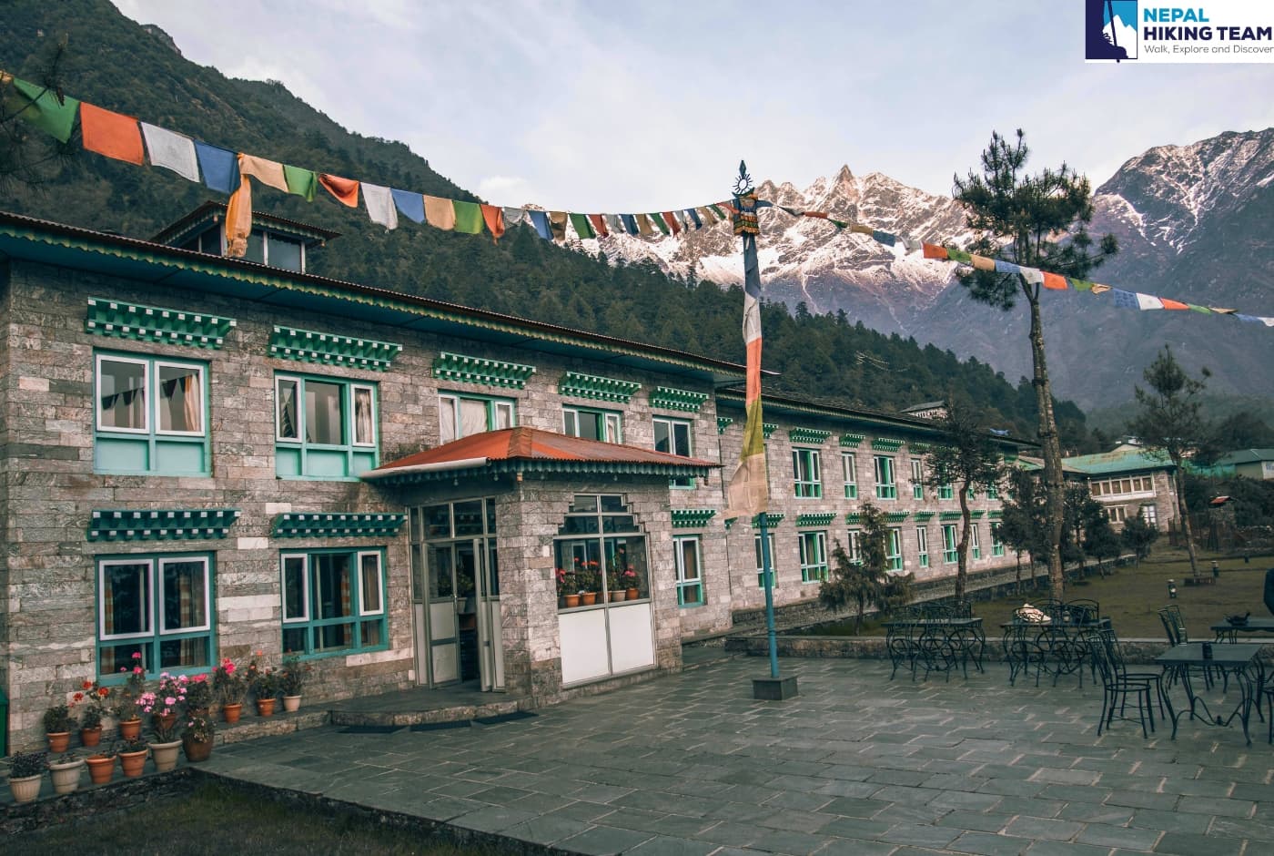 Mountain lodge, prayer flags   Lukla