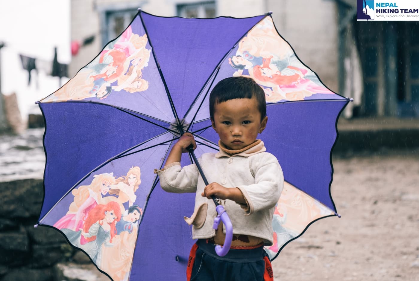 Child with colorful umbrella   Lukla , Everest Region