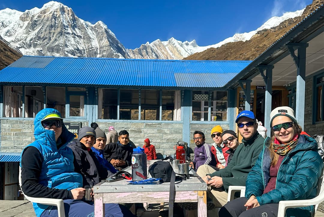 Trekking group resting at Machhapuchhre Base Camp teahouse