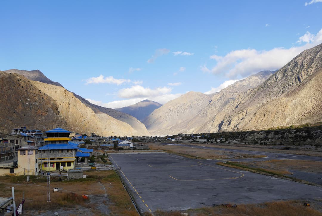 Jomsom Airport Runway Surrounded By Arid Mustang Valley And Towering Himalayan Mountains